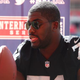 Menelik Watson of the Oakland Raiders speaks during an NFL Media Day at Wembley Stadium in London on July 16, 2014.
Charlie Crowhurst/Getty Images